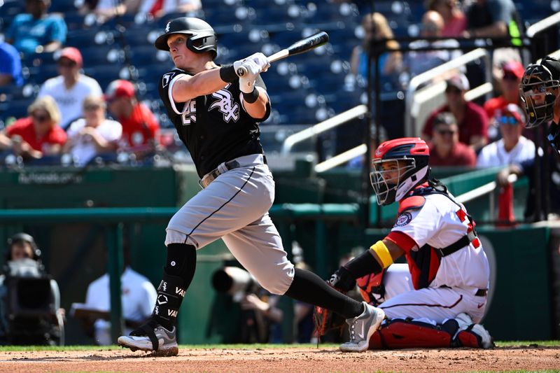 Sep 20, 2023; Washington, District of Columbia, USA; Chicago White Sox first baseman Andrew Vaughn (25) doubles against the Washington Nationals during the second inning at Nationals Park. Mandatory Credit: Brad Mills-USA TODAY Sports