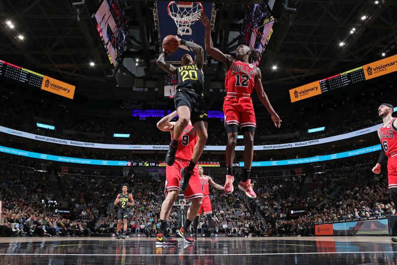 SALT LAKE CITY, UT - MARCH 6:John Collins #20 of the Utah Jazz shoots the ball during the game against the Chicago Bulls  on March 6, 2024 at Delta Center in Salt Lake City, Utah. NOTE TO USER: User expressly acknowledges and agrees that, by downloading and or using this Photograph, User is consenting to the terms and conditions of the Getty Images License Agreement. Mandatory Copyright Notice: Copyright 2024 NBAE (Photo by Melissa Majchrzak/NBAE via Getty Images)