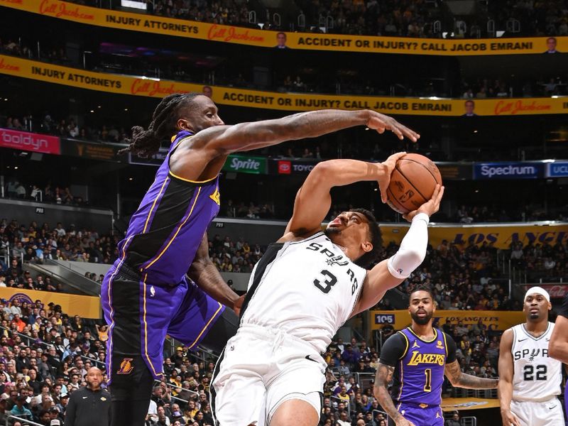 LOS ANGELES, CA - FEBRUARY 23: Keldon Johnson #3 of the San Antonio Spurs drives to the basket during the game against the Los Angeles Lakers on Feburary 23, 2024 at Crypto.Com Arena in Los Angeles, California. NOTE TO USER: User expressly acknowledges and agrees that, by downloading and/or using this Photograph, user is consenting to the terms and conditions of the Getty Images License Agreement. Mandatory Copyright Notice: Copyright 2024 NBAE (Photo by Andrew D. Bernstein/NBAE via Getty Images)