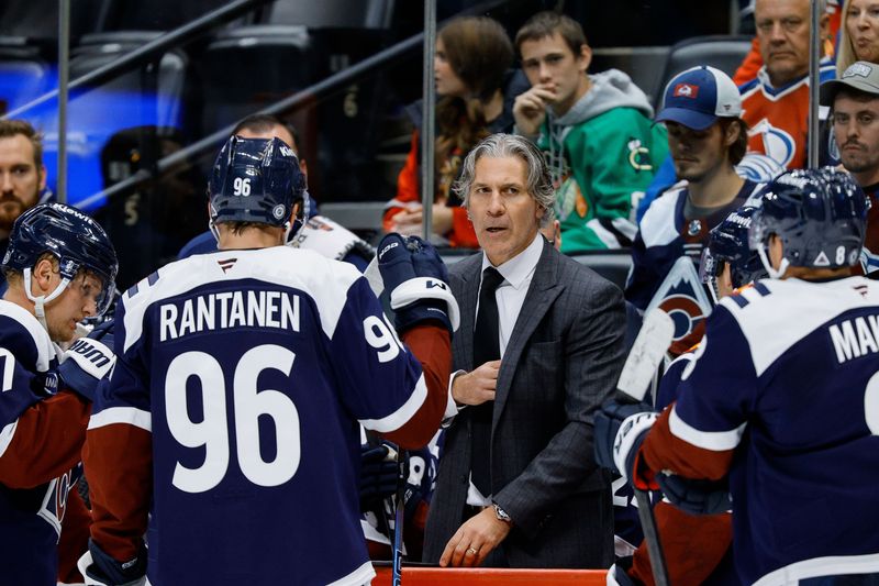 Oct 28, 2024; Denver, Colorado, USA; Colorado Avalanche head coach Jared Bednar talks with players in the third period against the Chicago Blackhawks at Ball Arena. Mandatory Credit: Isaiah J. Downing-Imagn Images