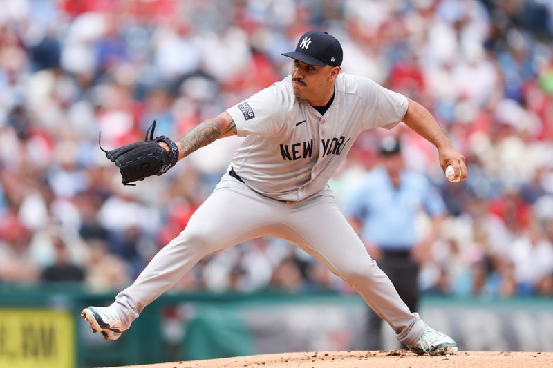 Jul 31, 2024; Philadelphia, Pennsylvania, USA;  New York Yankees pitcher Nestor Cortes (65) throws a pitch during the first inning against the Philadelphia Phillies at Citizens Bank Park. Mandatory Credit: Bill Streicher-USA TODAY Sports