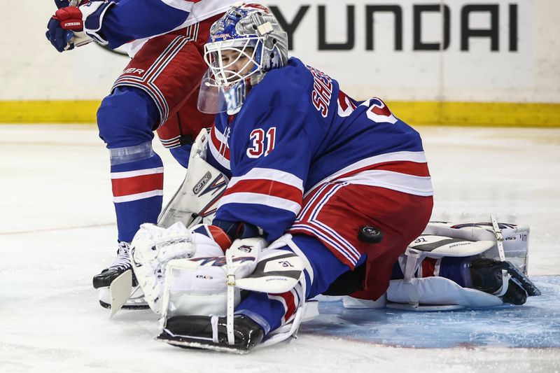 Nov 1, 2024; New York, New York, USA;  New York Rangers goaltender Igor Shesterkin (31) makes a save on a shot on goal attempt in the first period against the Ottawa Senators at Madison Square Garden. Mandatory Credit: Wendell Cruz-Imagn Images