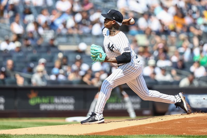 Aug 25, 2024; Bronx, New York, USA; New York Yankees pitcher Marcus Stroman (0) pitches in the first inning against the Colorado Rockies at Yankee Stadium. Mandatory Credit: Wendell Cruz-USA TODAY Sports