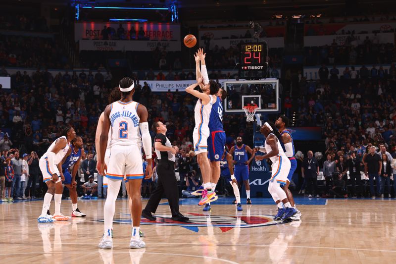 OKLAHOMA CITY, OK - FEBRUARY 22:  Chet Holmgren #7 of the Oklahoma City Thunder goes for the tip-off against the LA Clippers on February 22SF, 2024 at Paycom Arena in Oklahoma City, Oklahoma. NOTE TO USER: User expressly acknowledges and agrees that, by downloading and or using this photograph, User is consenting to the terms and conditions of the Getty Images License Agreement. Mandatory Copyright Notice: Copyright 2024 NBAE (Photo by Zach Beeker/NBAE via Getty Images)