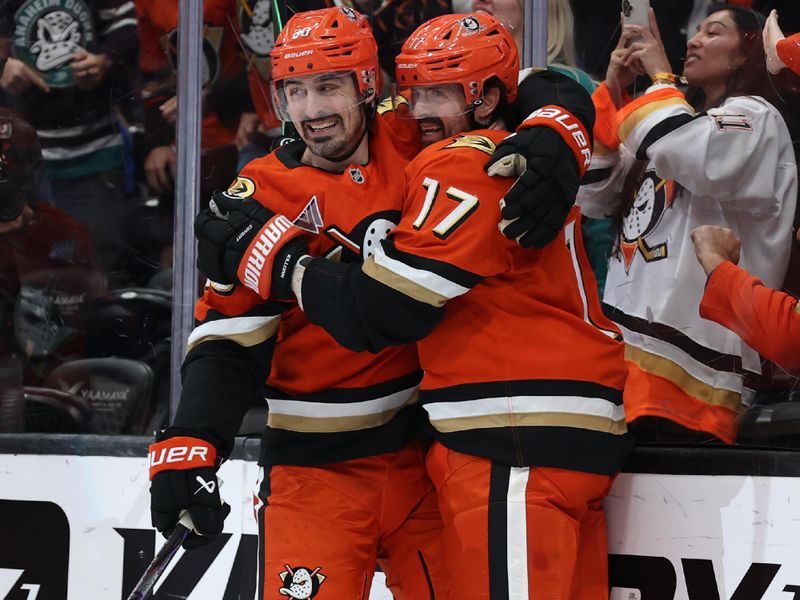 Jan 19, 2026; Anaheim, California, USA;  Anaheim Ducks left wing Alex Killorn (17) celebrates with left wing Chris Kreider (left) after scoring a goal during the second period against the New York Rangers at Honda Center. Mandatory Credit: Kiyoshi Mio-Imagn Images