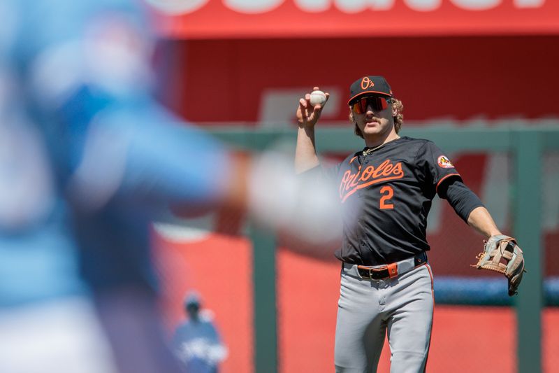 Apr 21, 2024; Kansas City, Missouri, USA; Baltimore Orioles shortstop Gunnar Henderson (2) throws to first base during the second inning against the Kansas City Royals at Kauffman Stadium. Mandatory Credit: William Purnell-USA TODAY Sports