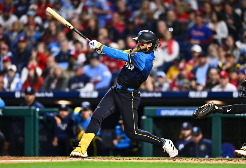 Apr 12, 2024; Philadelphia, Pennsylvania, USA; Philadelphia Phillies outfielder Brandon Marsh (16) hits a double against the Pittsburgh Pirates in the fifth inning at Citizens Bank Park. Mandatory Credit: Kyle Ross-USA TODAY Sports