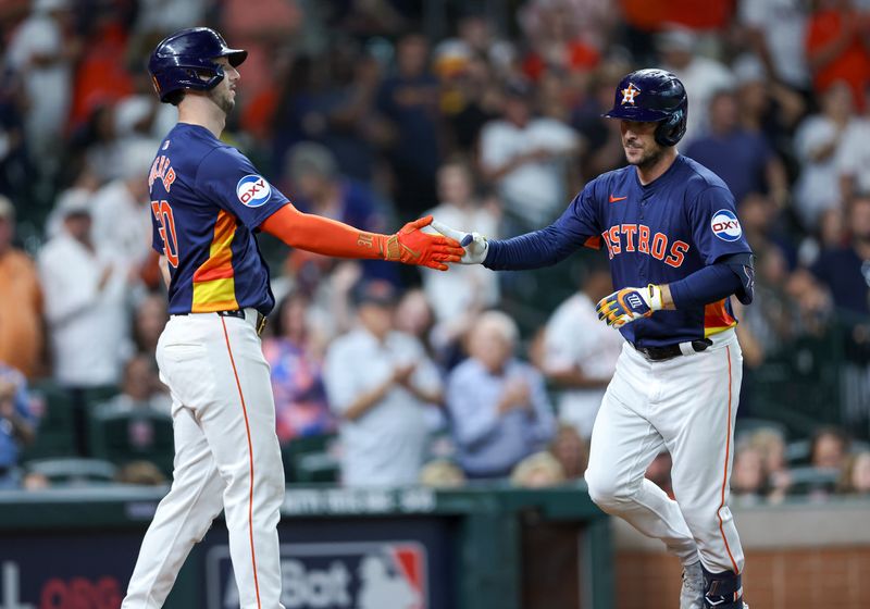Sep 8, 2024; Houston, Texas, USA; Houston Astros third baseman Alex Bregman (2) celebrates with designated hitter Kyle Tucker (30) after hitting a home run during the fourth inning against the Arizona Diamondbacks at Minute Maid Park. Mandatory Credit: Troy Taormina-Imagn Images