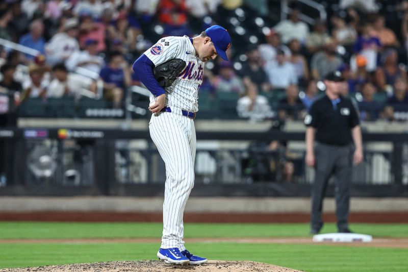 Jul 9, 2024; New York City, New York, USA;  New York Mets relief pitcher Adam Ottavino (0) reacts after giving up a two run home run in the eighth inning against the Washington Nationals at Citi Field. Mandatory Credit: Wendell Cruz-USA TODAY Sports