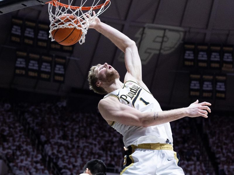 Jan 29, 2023; West Lafayette, Indiana, USA; Purdue Boilermakers forward Caleb Furst (1) shoots the ball while Michigan State Spartans center Mady Sissoko (22) defends in the second half at Mackey Arena. Mandatory Credit: Trevor Ruszkowski-USA TODAY Sports