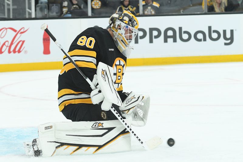 Sep 21, 2025; Boston, Massachusetts, USA; Boston Bruins goaltender Michael DiPietro (80) makes a save during the second period against the Washington Capitals at TD Garden. Mandatory Credit: Bob DeChiara-Imagn Images