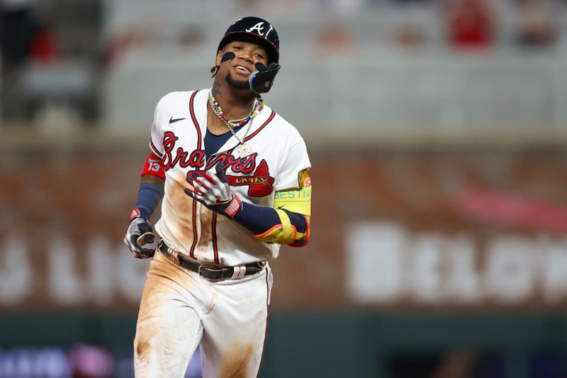 Sep 19, 2023; Atlanta, Georgia, USA; Atlanta Braves right fielder Ronald Acuna Jr. (13) celebrates after a home run against the Philadelphia Phillies in the sixth inning at Truist Park. Mandatory Credit: Brett Davis-USA TODAY Sports
