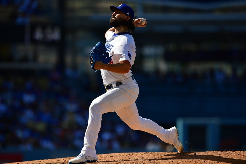 Jun 25, 2023; Los Angeles, California, USA; Los Angeles Dodgers starting pitcher Tony Gonsolin (26) throws against the Houston Astros during the fourth inning at Dodger Stadium. Mandatory Credit: Gary A. Vasquez-USA TODAY Sports