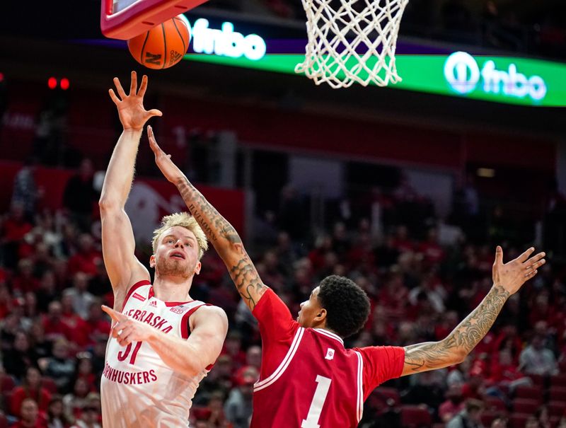 Jan 3, 2024; Lincoln, Nebraska, USA; Nebraska Cornhuskers forward Rienk Mast (51) shoots the ball against Indiana Hoosiers center Kel'el Ware (1) during the first half at Pinnacle Bank Arena. Mandatory Credit: Dylan Widger-USA TODAY Sports