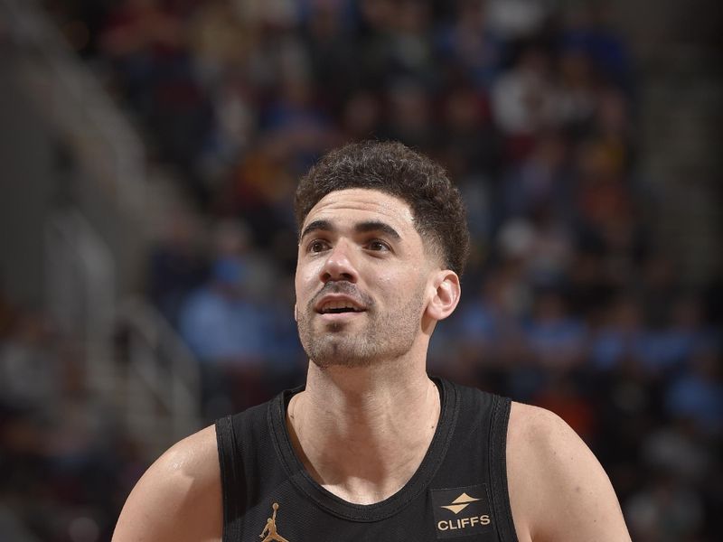 CLEVELAND, OH - APRIL 10: Georges Niang #20 of the Cleveland Cavaliers shoots a free throw during the game against the Memphis Grizzlies on April 10, 2024 at Rocket Mortgage FieldHouse in Cleveland, Ohio. NOTE TO USER: User expressly acknowledges and agrees that, by downloading and/or using this Photograph, user is consenting to the terms and conditions of the Getty Images License Agreement. Mandatory Copyright Notice: Copyright 2024 NBAE (Photo by David Liam Kyle/NBAE via Getty Images)