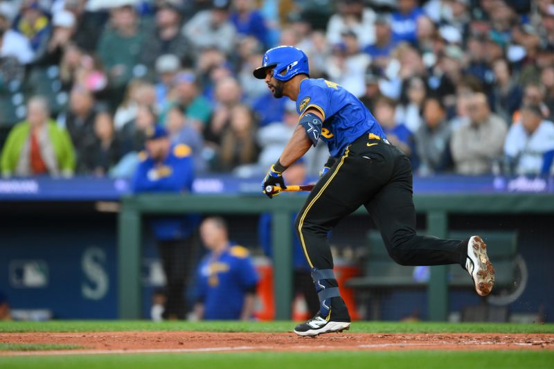 May 29, 2025; Seattle, Washington, USA; Seattle Mariners right fielder Leody Taveras (4) runs towards first base after hitting a single against Washington Nationals during the sixth inning at T-Mobile Park. Mandatory Credit: Steven Bisig-Imagn Images