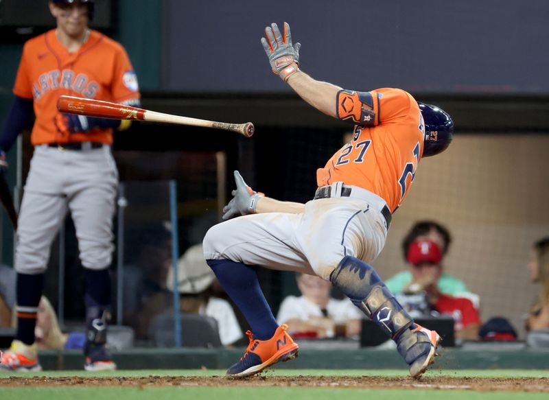 Oct 19, 2023; Arlington, Texas, USA; Houston Astros second baseman Jose Altuve (27) is brushed back by a pitch during the fourth inning in game four of the ALCS against the Texas Rangers for the 2023 MLB playoffs at Globe Life Field. Mandatory Credit: Kevin Jairaj-USA TODAY Sports