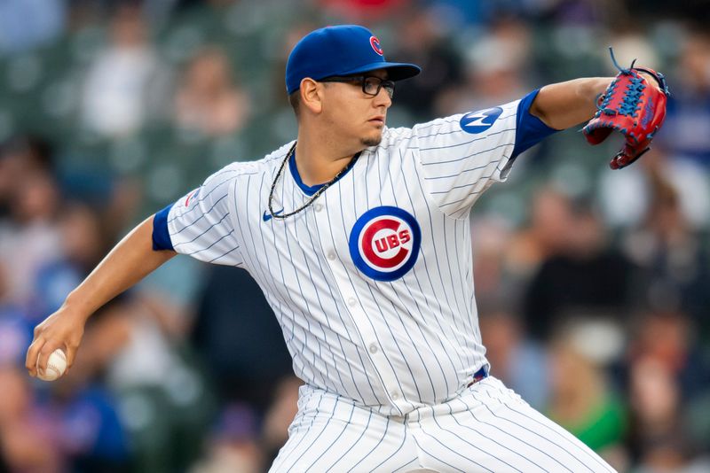 Aug 20, 2024; Chicago, Illinois, USA; Chicago Cubs starting pitcher Javier Assad (72) pitches during the first inning against the Detroit Tigers at Wrigley Field. Mandatory Credit: Patrick Gorski-USA TODAY Sports