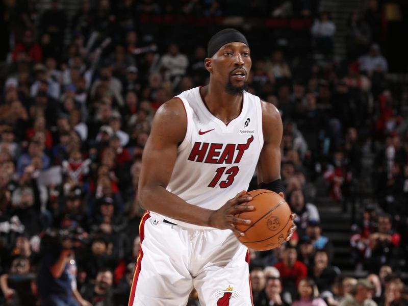 PORTLAND, OR - JANUARY 11: Bam Adebayo #13 of the Miami Heat handles the ball during the game against the Portland Trail Blazers on January 11, 2025 at the Moda Center Arena in Portland, Oregon. NOTE TO USER: User expressly acknowledges and agrees that, by downloading and or using this photograph, user is consenting to the terms and conditions of the Getty Images License Agreement. Mandatory Copyright Notice: Copyright 2025 NBAE (Photo by Cameron Browne/NBAE via Getty Images)