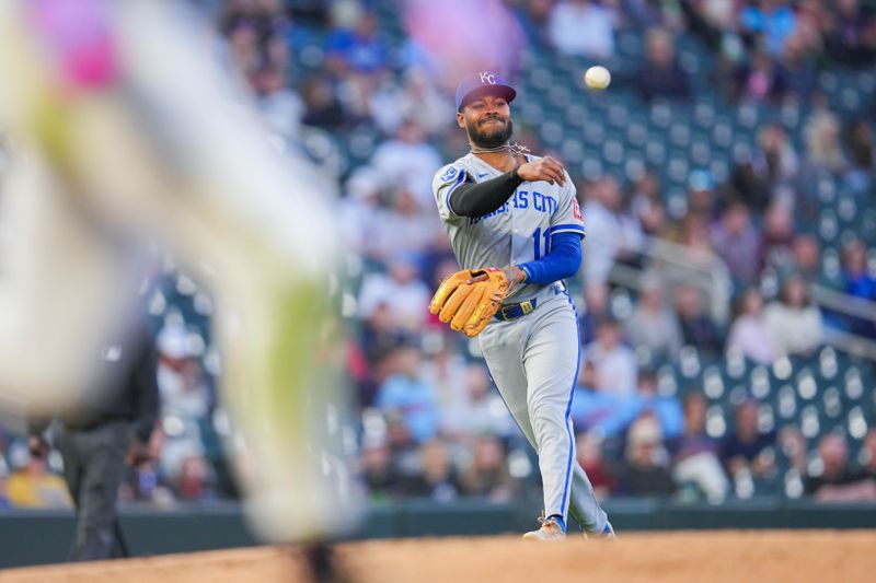 May 23, 2025; Minneapolis, Minnesota, USA; Kansas City Royals third base Maikel Garcia (11) throws to first base against the Minnesota Twins in the fifth inning at Target Field. Mandatory Credit: Brad Rempel-Imagn Images