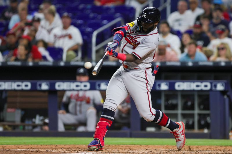 Sep 16, 2023; Miami, Florida, USA; Atlanta Braves center fielder Michael Harris II (23) hits a home run against the Miami Marlins during the fifth inning at loanDepot Park. Mandatory Credit: Sam Navarro-USA TODAY Sports