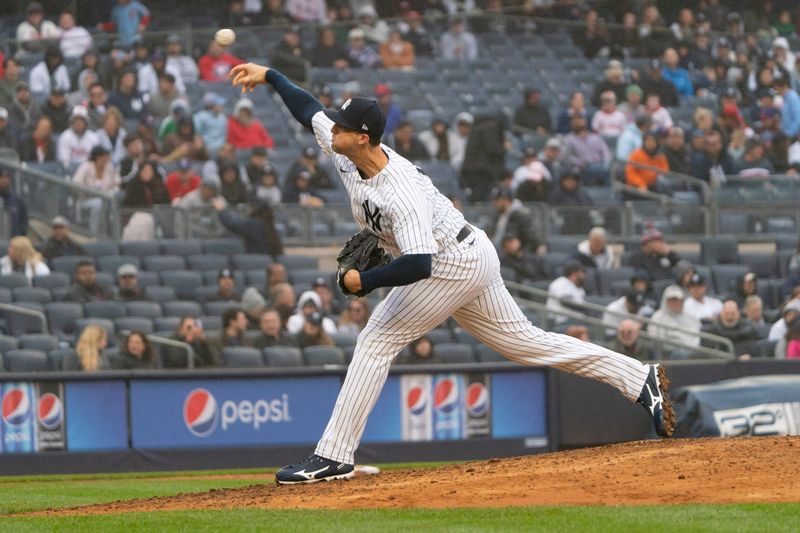 Apr 5, 2023; Bronx, New York, USA; New York Yankees pitcher Clay Holmes (35) delivers a pitch against the Philadelphia Phillies during the ninth inning at Yankee Stadium. Mandatory Credit: Gregory Fisher-USA TODAY Sports