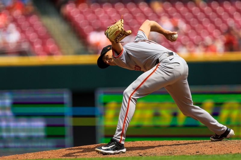 Aug 4, 2024; Cincinnati, Ohio, USA; San Francisco Giants relief pitcher Tyler Rogers (71) pitches against the Cincinnati Reds in the eighth inning at Great American Ball Park. Mandatory Credit: Katie Stratman-USA TODAY Sports