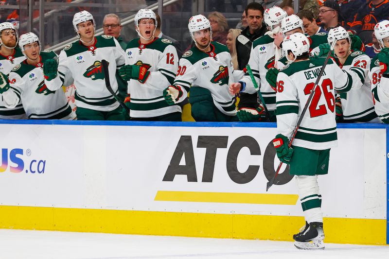 Dec 8, 2023; Edmonton, Alberta, CAN; The Minnesota Wild celebrate a goal scored by   forward Connor Dewar (26) during the second period against the Edmonton Oilers at Rogers Place. Mandatory Credit: Perry Nelson-USA TODAY Sports