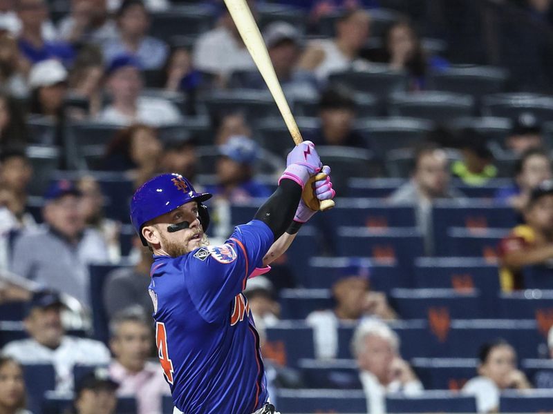 Jun 26, 2024; New York City, New York, USA;  New York Mets center fielder Harrison Bader (44) hits an RBI double in the fifth inning against the New York Yankees at Citi Field. Mandatory Credit: Wendell Cruz-USA TODAY Sports