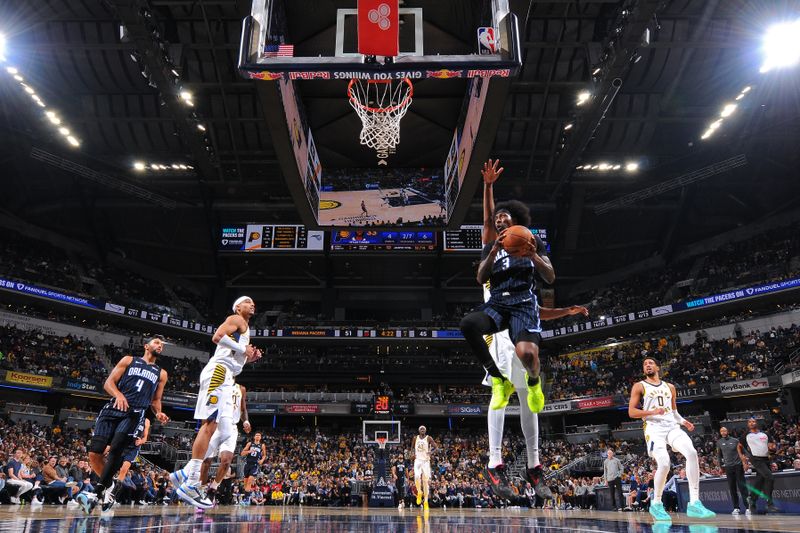 INDIANAPOLIS, IN - NOVEMBER 6: Kentavious Caldwell-Pope #3 of the Orlando Magic drives to the basket during the game against the Indiana Pacers on November 6, 2024 at Gainbridge Fieldhouse in Indianapolis, Indiana. NOTE TO USER: User expressly acknowledges and agrees that, by downloading and or using this Photograph, user is consenting to the terms and conditions of the Getty Images License Agreement. Mandatory Copyright Notice: Copyright 2024 NBAE (Photo by Ron Hoskins/NBAE via Getty Images)