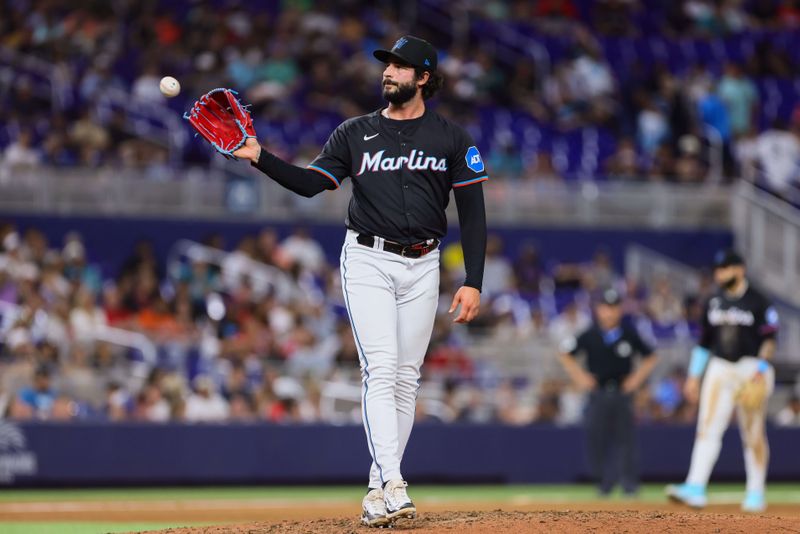 Apr 12, 2024; Miami, Florida, USA; Miami Marlins pitcher Andrew Nardi (43) pitches against the Atlanta Braves during the seventh inning at loanDepot Park. Mandatory Credit: Sam Navarro-USA TODAY Sports