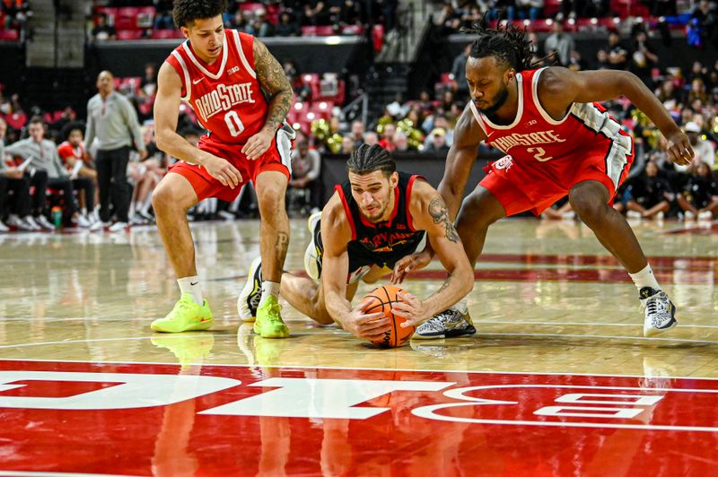 Feb 5, 2026; College Park, Maryland, USA;  Maryland Terrapins center Collin Metcalf (45) dives for a loose ball in-between Ohio State Buckeyes guard John Mobley Jr. (0) and guard Bruce Thornton (2) during the second half at Xfinity Center. Mandatory Credit: Tommy Gilligan-Imagn Images