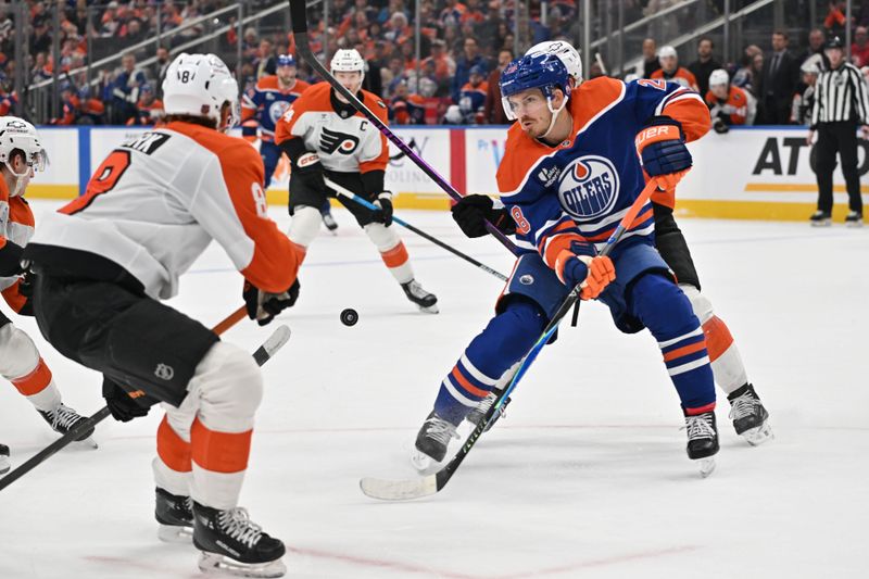 Jan 3, 2026; Edmonton, Alberta, CAN;  Philadelphia Flyers defenseman Cam York (8) skates towards Edmonton Oilers left winger Andrew Mangiapane (88) during the first period at Rogers Place. Mandatory Credit: Walter Tychnowicz-Imagn Images