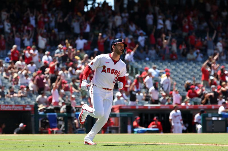 Jul 28, 2024; Anaheim, California, USA;  Los Angeles Angels left fielder Taylor Ward (3) runs around bases after hitting a grand slam during the fourth inning against the Oakland Athletics at Angel Stadium. Mandatory Credit: Kiyoshi Mio-USA TODAY Sports