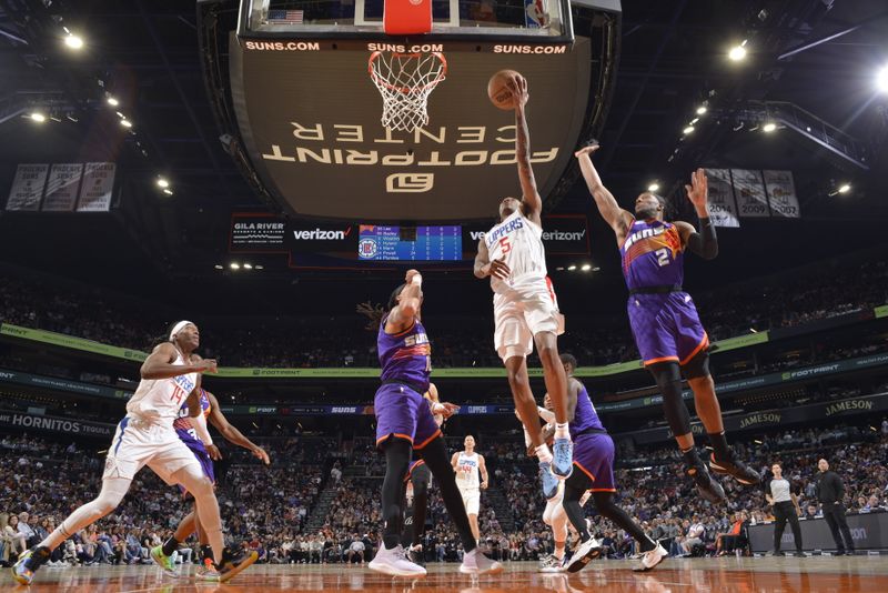 PHOENIX, AZ - APRIL 9: Bones Hyland #5 of the LA Clippers shoots the ball during the game against the Phoenix Suns on April 9, 2023 at Footprint Center in Phoenix, Arizona. NOTE TO USER: User expressly acknowledges and agrees that, by downloading and or using this photograph, user is consenting to the terms and conditions of the Getty Images License Agreement. Mandatory Copyright Notice: Copyright 2023 NBAE (Photo by Barry Gossage/NBAE via Getty Images)