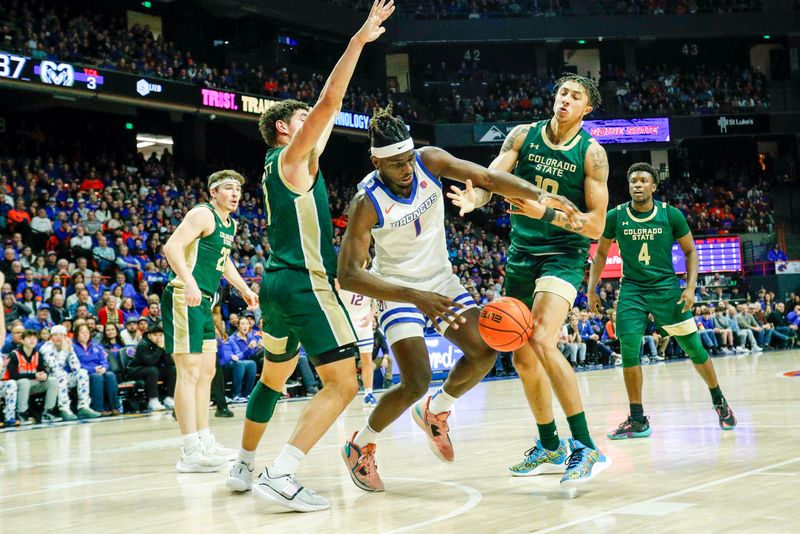 Jan 9, 2024; Boise, Idaho, USA; Boise State Broncos forward O'Mar Stanley (1) and Colorado State Rams guard Nique Clifford (10) battle for a rebound during the second half at ExtraMile Arena. Mandatory Credit: Brian Losness-USA TODAY Sports