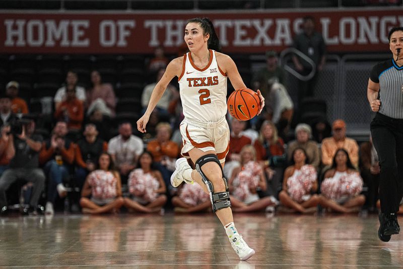 Jan 27, 2024; Austin, TX, USA; Texas Loghorns guard Shaylee Gonzales (2) dribbles the ball towards the Cincinnati Bearcats basket during a game at the Moody Center. Mandatory Credit: Aaron E. Martinez/American-Statesman via USA TODAY NETWORK