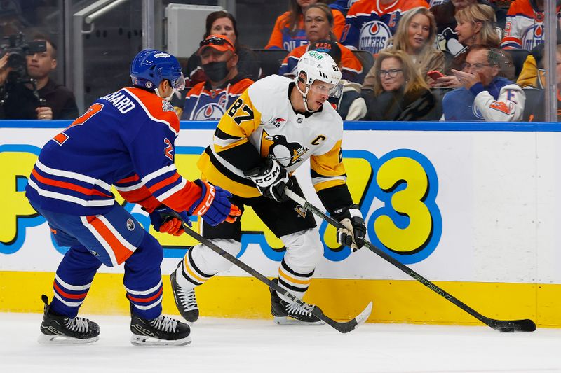 Oct 25, 2024; Edmonton, Alberta, CAN; Pittsburgh Penguins forward Sidney Crosby (87) looks to make a pass in front of Edmonton Oilers defensemen Evan Bouchard (2) during the second period at Rogers Place. Mandatory Credit: Perry Nelson-Imagn Images