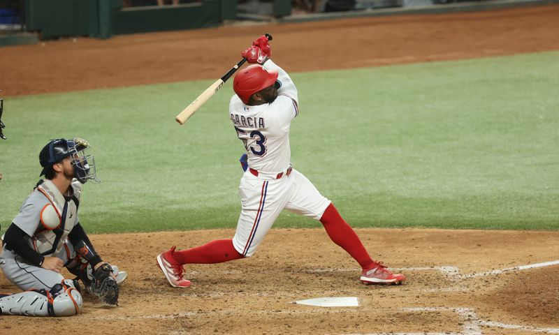 Jun 28, 2023; Arlington, Texas, USA;  Texas Rangers right fielder Adolis Garcia (53) hits a two-run home run during the sixth inning against the Detroit Tigers at Globe Life Field. Mandatory Credit: Kevin Jairaj-USA TODAY Sports