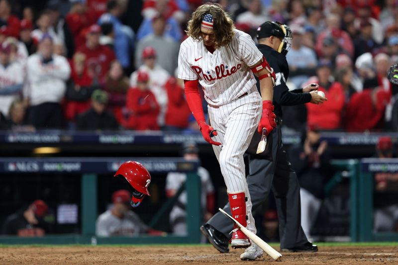 Oct 24, 2023; Philadelphia, Pennsylvania, USA; Philadelphia Phillies first baseman Alec Bohm (28) reacts after striking out against the Arizona Diamondbacks in the eighth inning for game seven of the NLCS for the 2023 MLB playoffs at Citizens Bank Park. Mandatory Credit: Bill Streicher-USA TODAY Sports