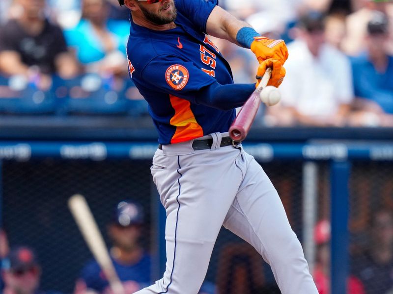 Mar 13, 2023; West Palm Beach, Florida, USA; Houston Astros designated hitter David Hensley (17) hits a single against the Washington Nationals during the second inning at The Ballpark of the Palm Beaches. Mandatory Credit: Rich Storry-USA TODAY Sports