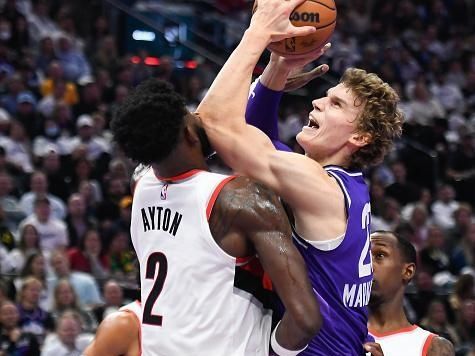 SALT LAKE CITY, UTAH - NOVEMBER 14: Lauri Markkanen #23 of the Utah Jazz shoots over Deandre Ayton #2 of the Portland Trail Blazers during the first half of an NBA In-Season Tournament game at Delta Center on November 14, 2023 in Salt Lake City, Utah. NOTE TO USER: User expressly acknowledges and agrees that, by downloading and or using this photograph, User is consenting to the terms and conditions of the Getty Images License Agreement. (Photo by Alex Goodlett/Getty Images)