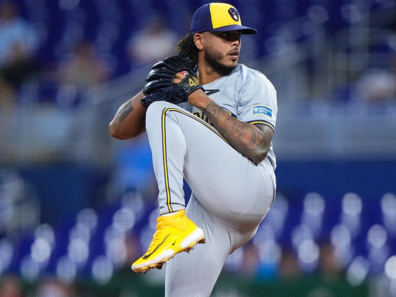 May 22, 2024; Miami, Florida, USA; Milwaukee Brewers pitcher Freddy Peralta (51) throws a pitch against the Miami Marlins during the first inning at loanDepot Park. Mandatory Credit: Rich Storry-USA TODAY Sports