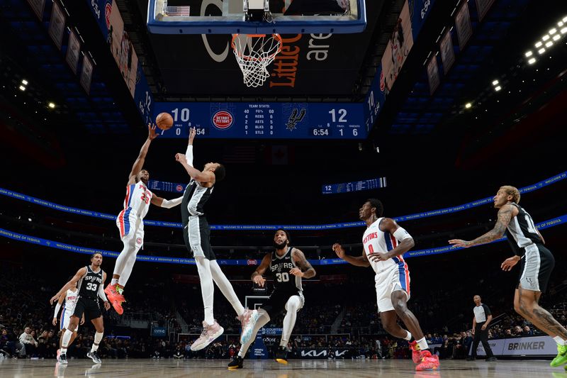 DETROIT, MI - JANUARY 10: Jaden Ivey #23 of the Detroit Pistons drives to the basket during the game as Victor Wembanyama #1 of the San Antonio Spurs plays defense on January 10, 2024 at Little Caesars Arena in Detroit, Michigan. NOTE TO USER: User expressly acknowledges and agrees that, by downloading and/or using this photograph, User is consenting to the terms and conditions of the Getty Images License Agreement. Mandatory Copyright Notice: Copyright 2024 NBAE (Photo by Chris Schwegler/NBAE via Getty Images)