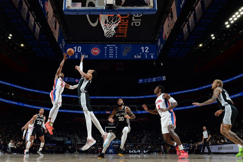 DETROIT, MI - JANUARY 10: Jaden Ivey #23 of the Detroit Pistons drives to the basket during the game as Victor Wembanyama #1 of the San Antonio Spurs plays defense on January 10, 2024 at Little Caesars Arena in Detroit, Michigan. NOTE TO USER: User expressly acknowledges and agrees that, by downloading and/or using this photograph, User is consenting to the terms and conditions of the Getty Images License Agreement. Mandatory Copyright Notice: Copyright 2024 NBAE (Photo by Chris Schwegler/NBAE via Getty Images)