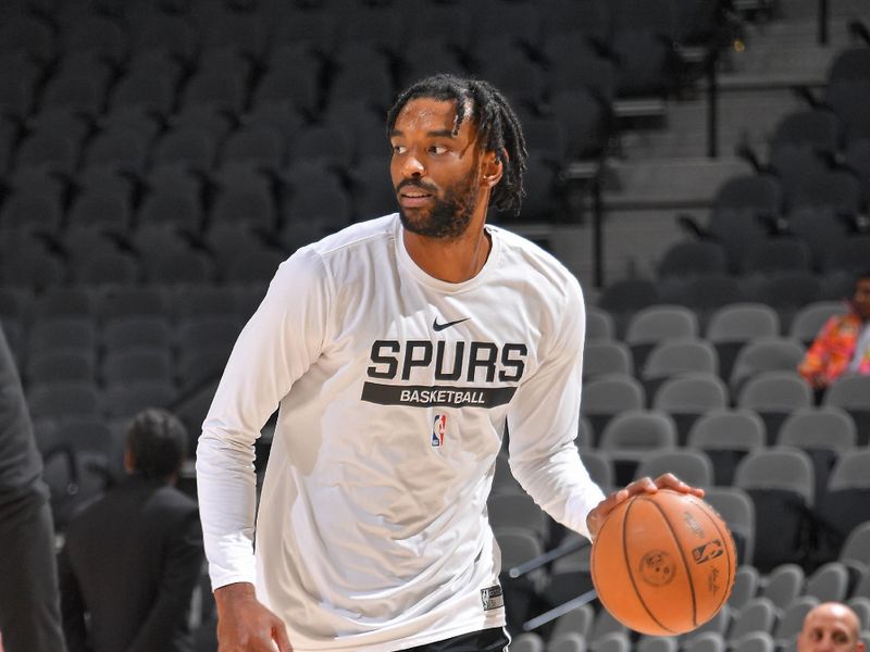 SAN ANTONIO, TX - MARCH 14: Keita Bates-Diop #31 of the San Antonio Spurs warms up before the game against the Orlando Magic on March 14, 2023 at the AT&T Center in San Antonio, Texas. NOTE TO USER: User expressly acknowledges and agrees that, by downloading and or using this photograph, user is consenting to the terms and conditions of the Getty Images License Agreement. Mandatory Copyright Notice: Copyright 2023 NBAE (Photos by Michael Gonzales/NBAE via Getty Images)