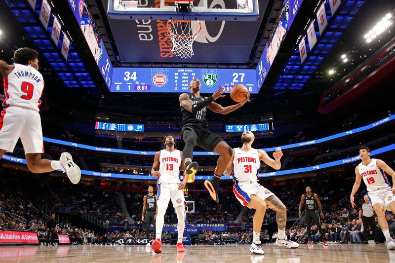 DETROIT, MI - MARCH 7: Lonnie Walker IV #8 of the Brooklyn Nets drives to the basket during the game against the Detroit Pistons on March 7, 2024 at Little Caesars Arena in Detroit, Michigan. NOTE TO USER: User expressly acknowledges and agrees that, by downloading and/or using this photograph, User is consenting to the terms and conditions of the Getty Images License Agreement. Mandatory Copyright Notice: Copyright 2024 NBAE (Photo by Brian Sevald/NBAE via Getty Images)