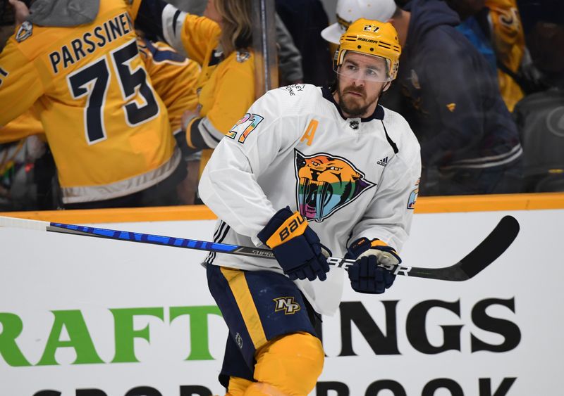 Apr 4, 2023; Nashville, Tennessee, USA; Nashville Predators defenseman Ryan McDonagh (27) takes the ice with teammates wearing Pride Night jerseys before the game against the Vegas Golden Knights at Bridgestone Arena. Mandatory Credit: Christopher Hanewinckel-USA TODAY Sports