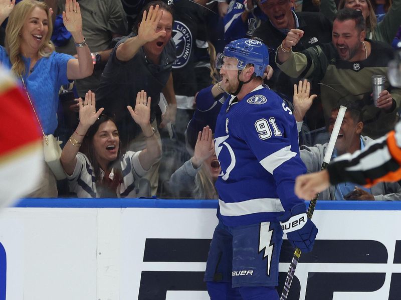 Apr 27, 2024; Tampa, Florida, USA; Tampa Bay Lightning center Steven Stamkos (91) celebrates after he scored a goal during the third period in game four of the first round of the 2024 Stanley Cup Playoffs at Amalie Arena. Mandatory Credit: Kim Klement Neitzel-USA TODAY Sports