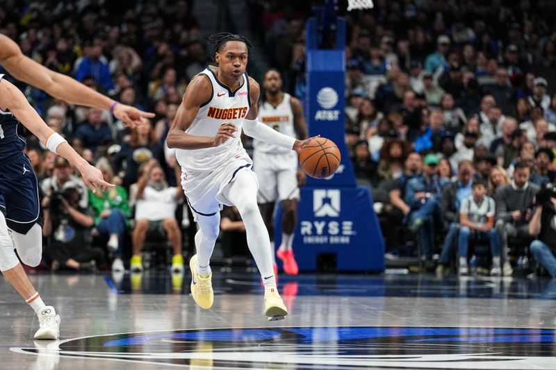 DALLAS, TX - JANUARY 12: Peyton Watson #8 of the Denver Nuggets dribbles the ball during the game against the Dallas Mavericks on January 12, 2025 at American Airlines Center in Dallas, Texas. NOTE TO USER: User expressly acknowledges and agrees that, by downloading and or using this photograph, User is consenting to the terms and conditions of the Getty Images License Agreement. Mandatory Copyright Notice: Copyright 2025 NBAE (Photo by Glenn James/NBAE via Getty Images)